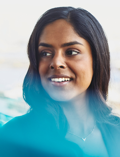Close up - Smiling woman looking away
