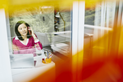 woman talking on the phone, from home