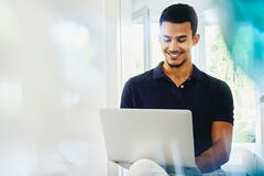 man working on a laptop