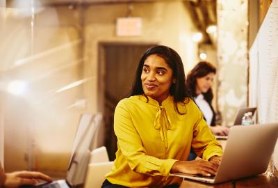 woman working and smiling