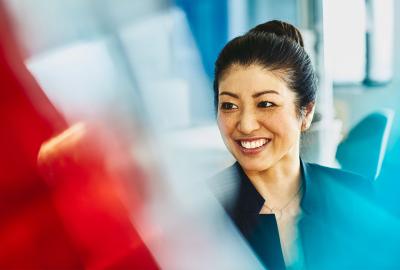 Smiling women on her workplace