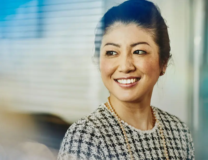 Close up - Smiling woman looking away