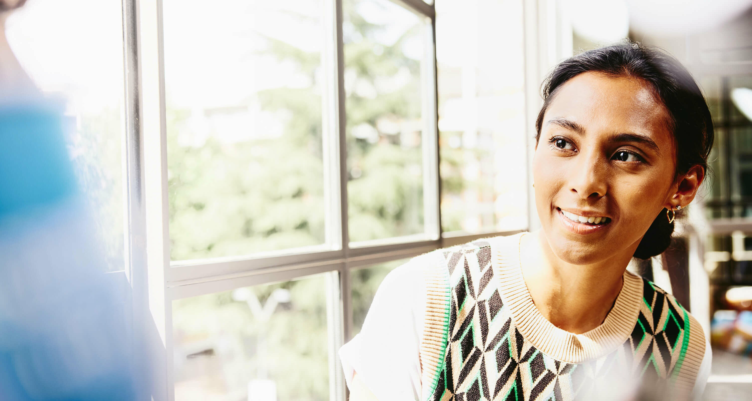 a woman looking at a colleague