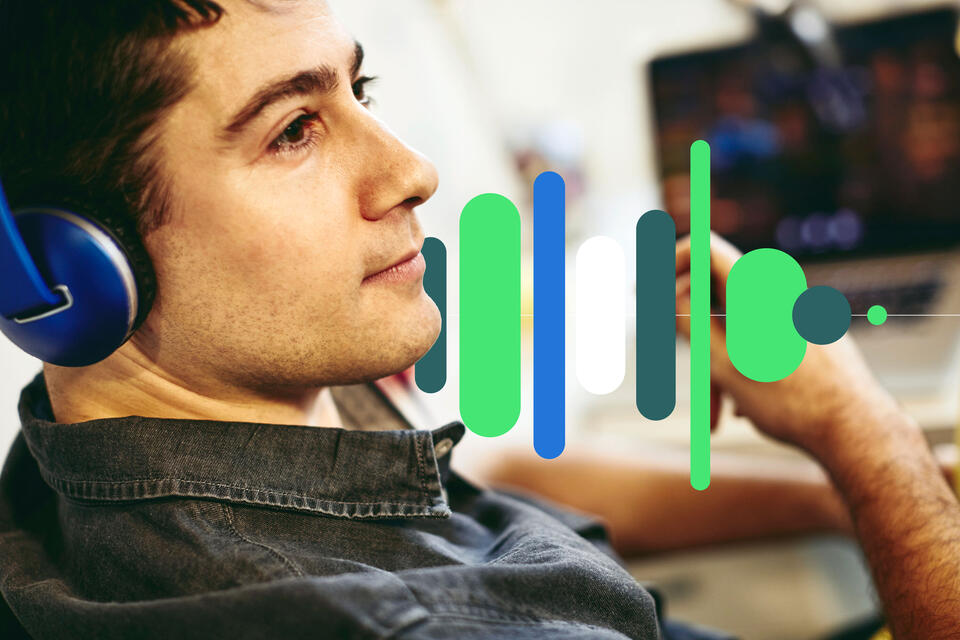 a man with headphones looking away