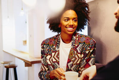 woman smiling to her colleague